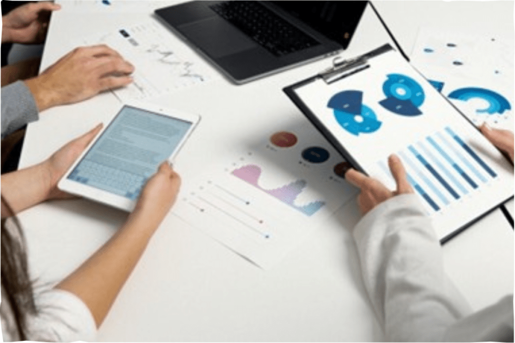 An audit team reviewing documents related to environmental compliance as well as on-site records in the course of an environmental compliance audit.